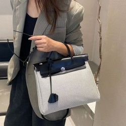 2025 New Niche Luxury Waterproof Canvas Kelly Bag - Button Patchwork Flip-Top Crossbody & Top-Handle Bag